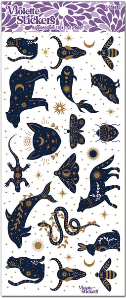 Dark blue mystical animal stickers with gold foil stars, moon and crystals.  Beautiful intricate gold foil overlay on dark blue animals. Beautiful brand new design! Clear stickers. by Violette Stickers